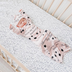 Baby in crib wearing Gown and Cap Set Pink / Well Noted Lifestyle