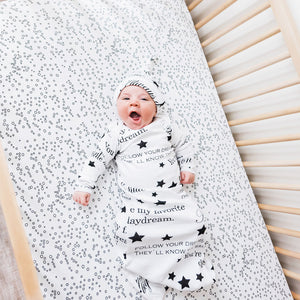 Infant yawning wearing Gown and Cap Set in White / Well Noted