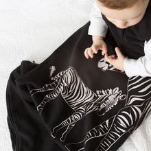 Load image into Gallery viewer, Cozy Basics Sleep Bag Black / Zebras Baby sitting