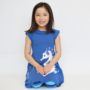 Girl kneeling in Dress Royal Blue / Seahorses