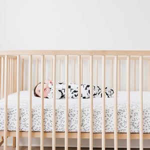 Baby lying in crib wearing Gown and Cap Set Modern Block